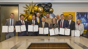 Leaders from the University of Missouri, Burns & McDonnell and the state of Missouri celebrate the signing of a major consulting agreement between the University of Missouri and Burns & McDonnell for NextGen MURR — a new, state-of-the-art research reactor at Mizzou.